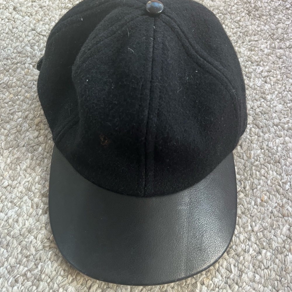 Coach baseball cap with COACH logo on the back. One size with snap back